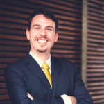 portrait picture of a white man in a suit