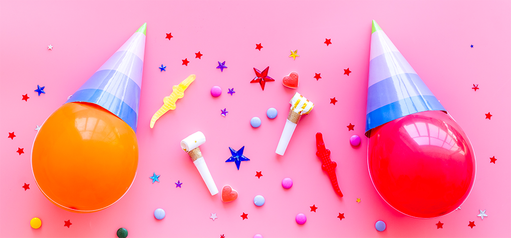 party themed picture, colorful cones, stars, hearts
